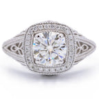 Top view of 2 CT cushion cut lab grown diamond ring with milgrain cushion halo and filigree shoulders