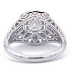 Underside view of lab grown diamond ring revealing intricate floral openwork gallery pattern