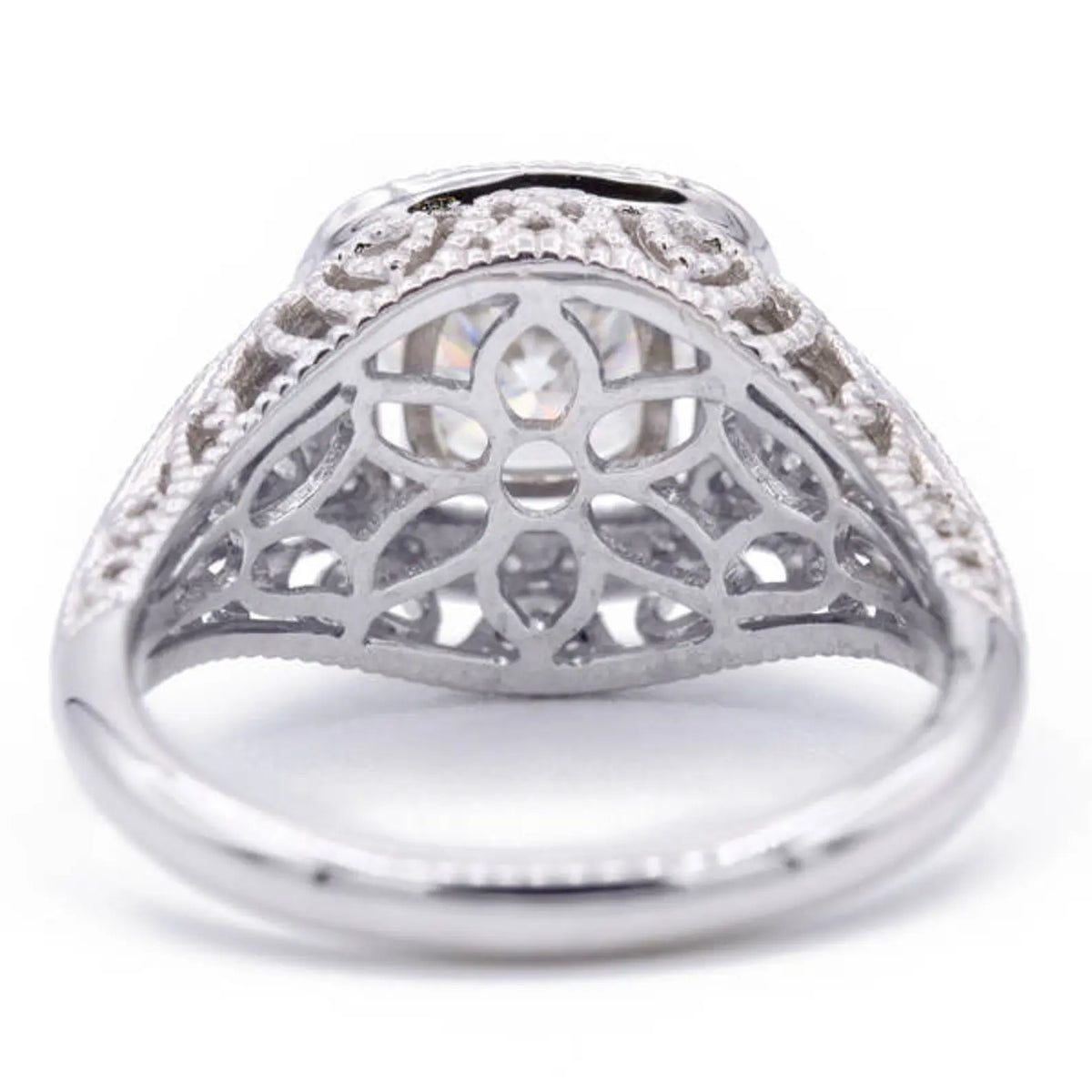 Underside view of lab grown diamond ring revealing intricate floral openwork gallery pattern