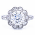 Direct top-down symmetry view of 3 CT round brilliant lab grown diamond inside floral scalloped halo bezel