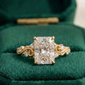 Side profile detail of a white gold 4 carat radiant cut lab diamond ring featuring antique scrollwork and milgrain detailing.