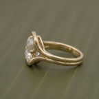 Side profile view showing the fluid split-shank architectural band of an Asscher lab diamond ring.