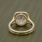 Under-gallery and inner band details of a 2 CT Asscher lab-grown diamond ring in yellow gold.