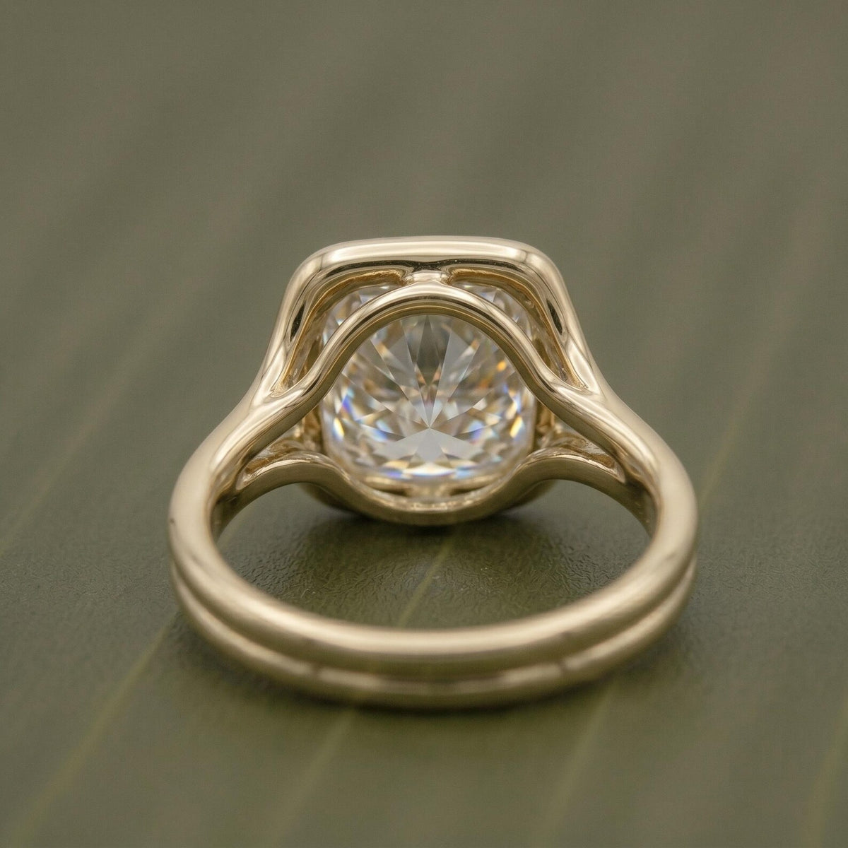 Under-gallery and inner band details of a 2 CT Asscher lab-grown diamond ring in yellow gold.