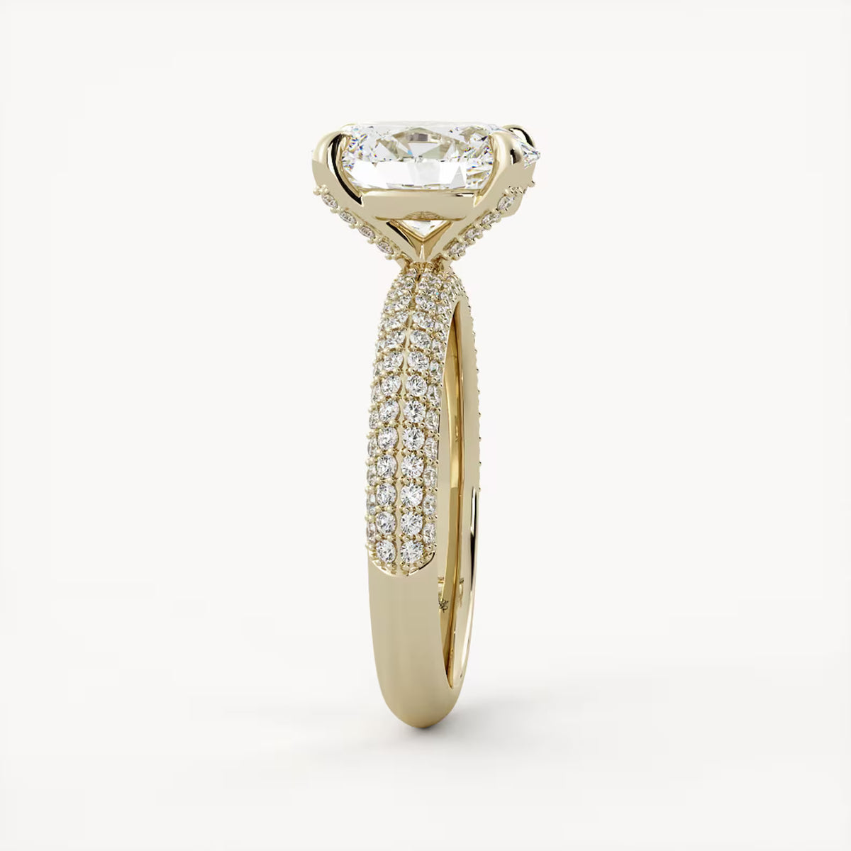 Detailed side perspective of a 2 carat oval lab diamond ring displaying the dense triple-row pavé band design.