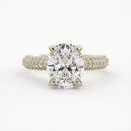 Front view of a 2 CT oval lab grown diamond engagement ring set in 14K yellow gold with a triple-row micro-pavé band.