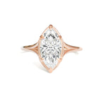 Studio top-down view of a 3 carat marquise cut lab grown diamond engagement ring in rose gold with milgrain bezel frame and split shank.