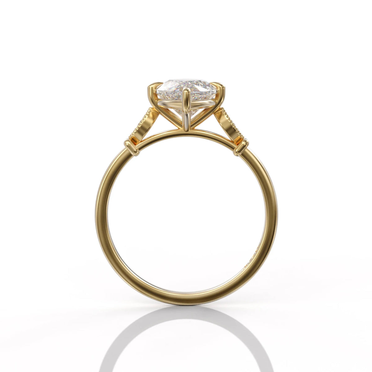 Side profile view of a 3 CT marquise lab grown diamond engagement ring in yellow gold showing gallery structure and band profile.