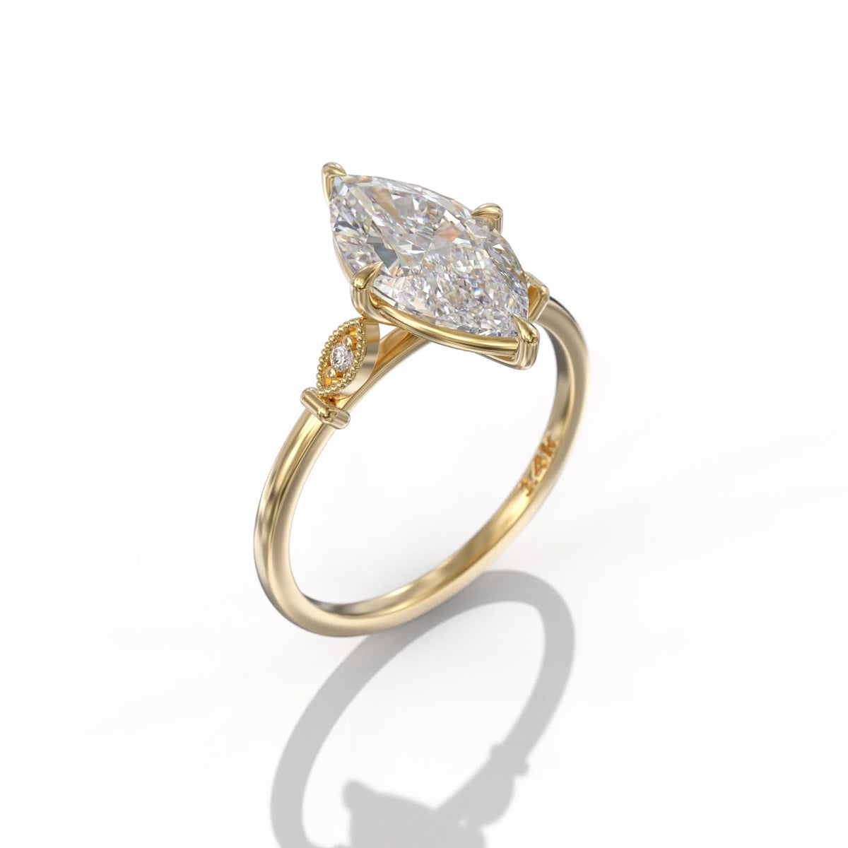 Perspective angle of a 3 CT marquise lab created diamond engagement ring in yellow gold with protective V-prongs.