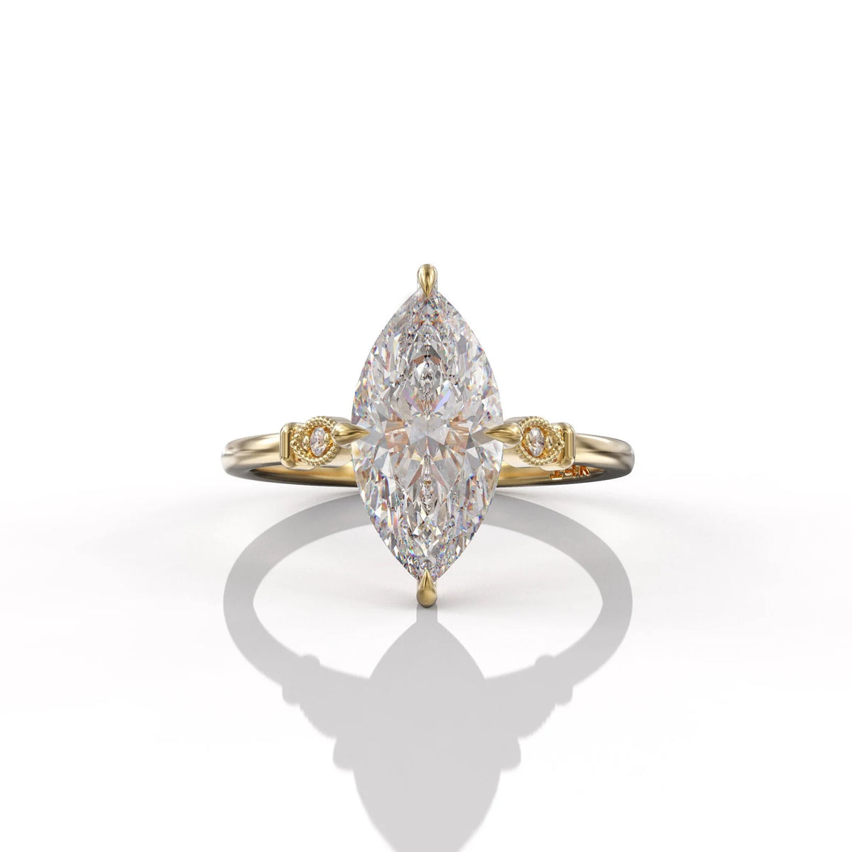 Top-down view of a 3 carat marquise lab grown diamond engagement ring in yellow gold showcasing brilliant cut facets and 6-prong setting.