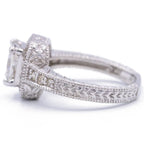 Side profile view of radiant lab diamond ring highlighting intricate wheat motif hand-engraving along the outer shank.