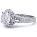 Side view of a round lab grown diamond ring showcasing split-shank transition and hand-carved chevron engraving.