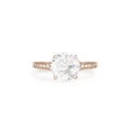 Studio product shot of a 2 CT round lab grown diamond engagement ring with filigree basket in rose gold.