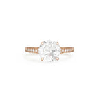 Studio product shot of a 2 CT round lab grown diamond engagement ring with filigree basket in rose gold.