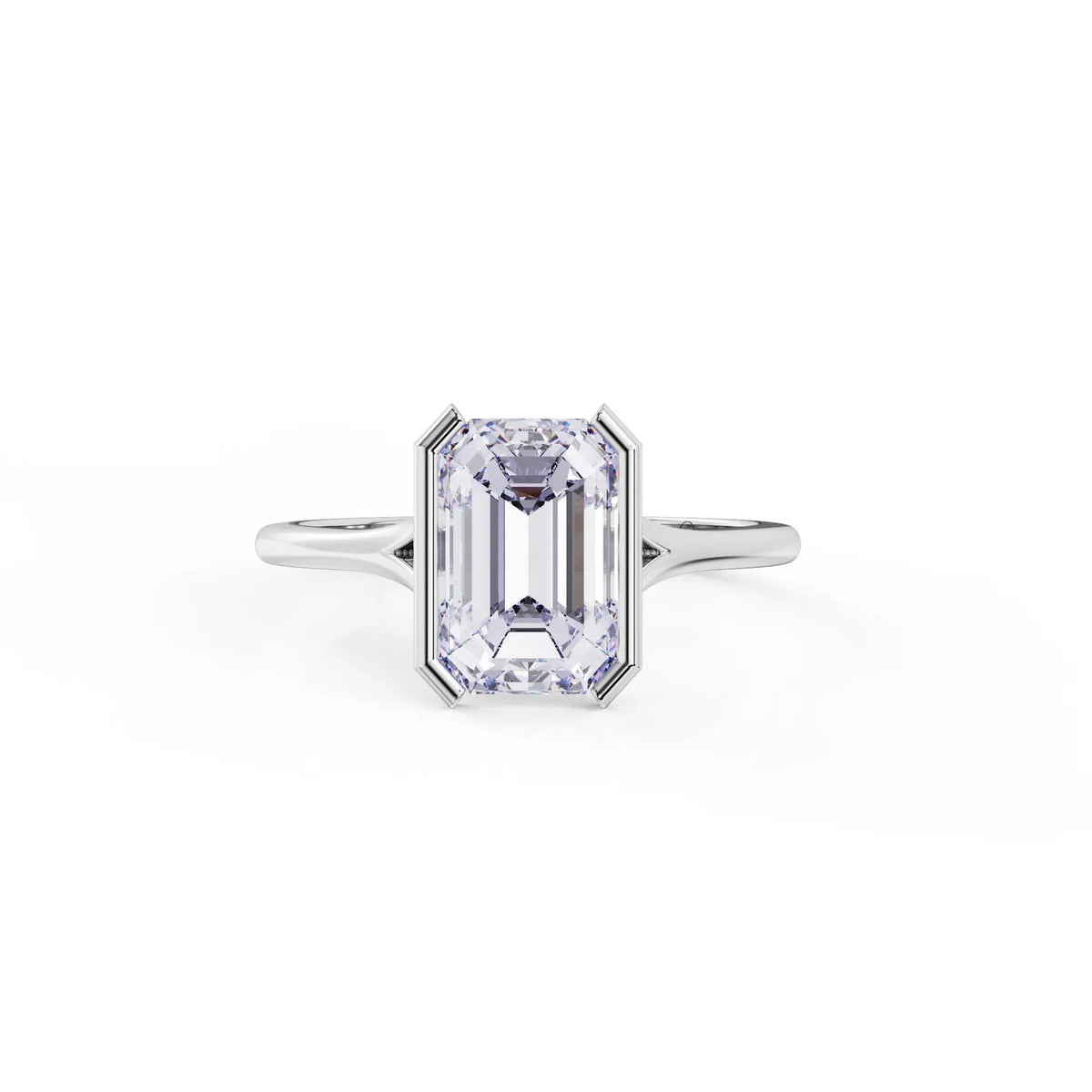 Top down view of a 3 carat emerald cut lab grown diamond set in a white gold half bezel frame ring.