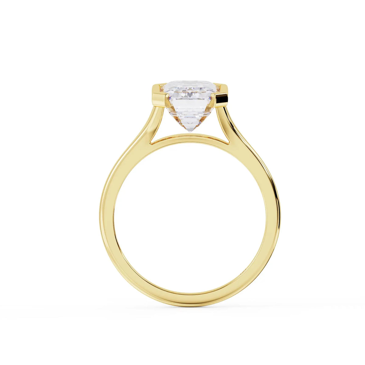 Direct side elevation shot of a 3 carat emerald cut lab diamond ring showing the high cathedral arch bridge in yellow gold.
