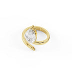 Top angled perspective of a 2 carat pear cut lab grown diamond set on a yellow gold swirl bypass shank.