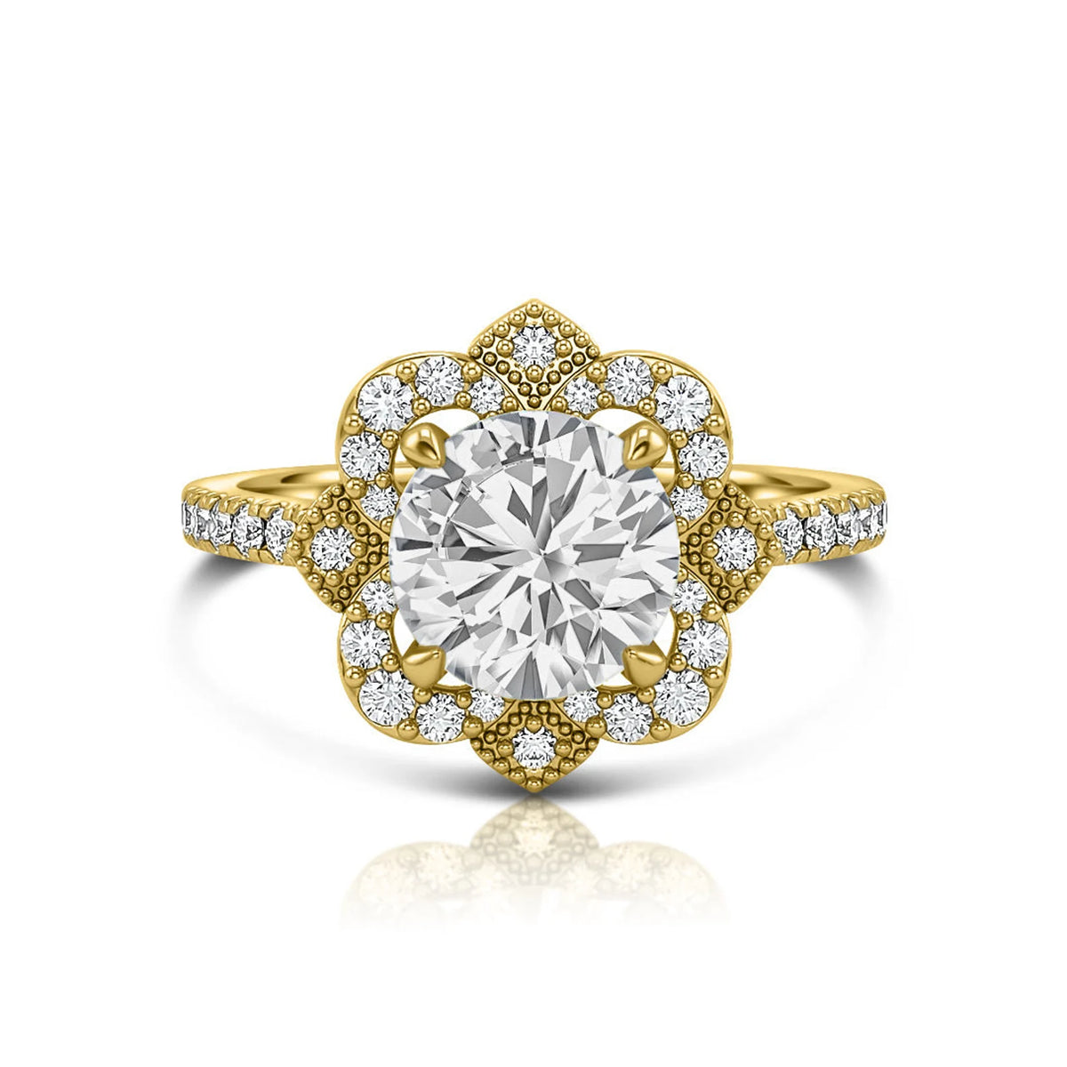 Top view of a 3 carat round brilliant lab diamond surrounded by a floral milgrain halo on a yellow gold pavé band.