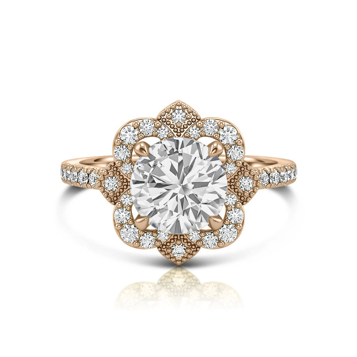 Top down view of a 3 carat round lab diamond vintage style floral halo ring set in rose gold with accent pavé diamonds.