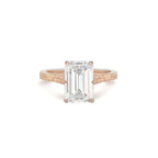 Front view of a 3 CT emerald cut lab created diamond engagement ring in rose gold featuring intricate vintage etched side shoulders.
