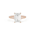 Front studio view of a 3 CT emerald cut lab created diamond ring in rose gold showing hand-carved floral shoulders with pavé diamond accents.