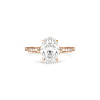 Studio front view of a 2 CT oval lab diamond engagement ring with engraved band in rose gold.