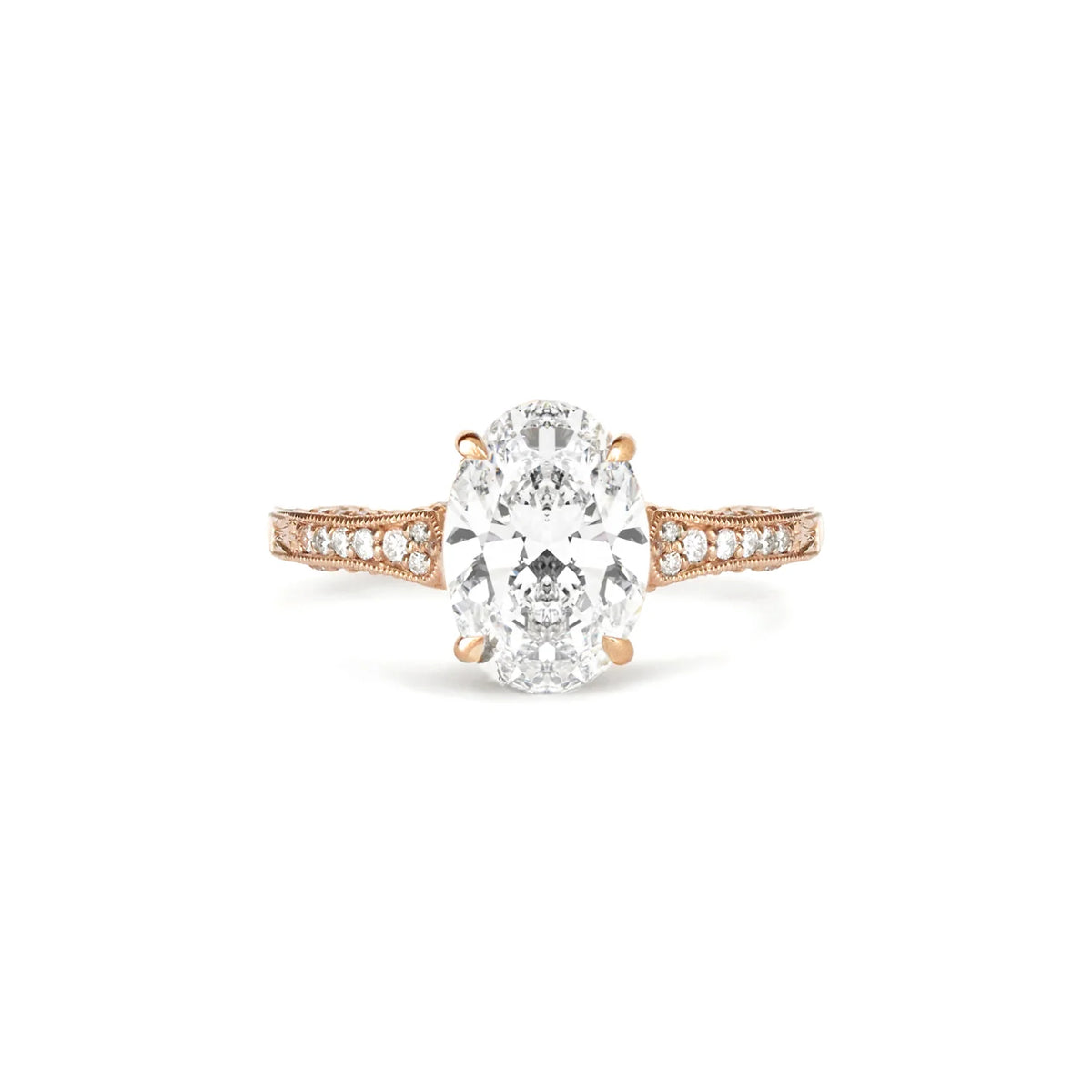 Studio front view of a 2 CT oval lab diamond engagement ring with engraved band in rose gold.