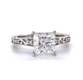 Direct front view of 2.5 CT princess cut lab grown diamond engagement ring showcasing brilliant facets and symmetrical engraved white gold band.