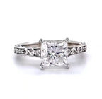 Direct front view of 2.5 CT princess cut lab grown diamond engagement ring showcasing brilliant facets and symmetrical engraved white gold band.