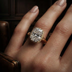 On-hand view of a 3 carat cushion cut lab diamond solitaire ring in yellow gold with split shank design.