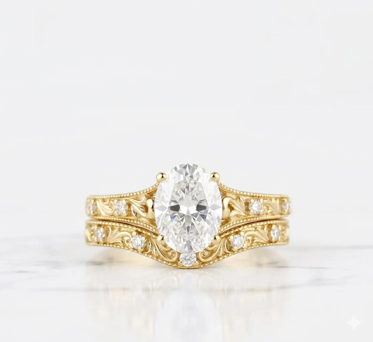 Front view of yellow gold 2 CT oval lab grown diamond ring with matching contoured filigree bridal band.