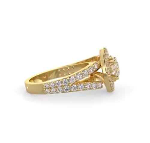 Side view of a yellow gold 2 carat round lab grown diamond engagement ring with double pavé split shank.