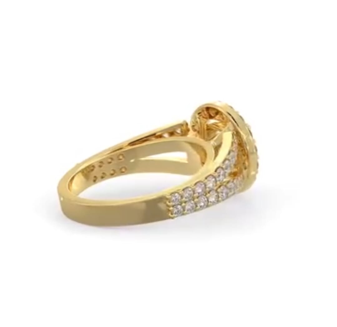 Side profile showing the yellow gold band construction and split shank pave detailing.