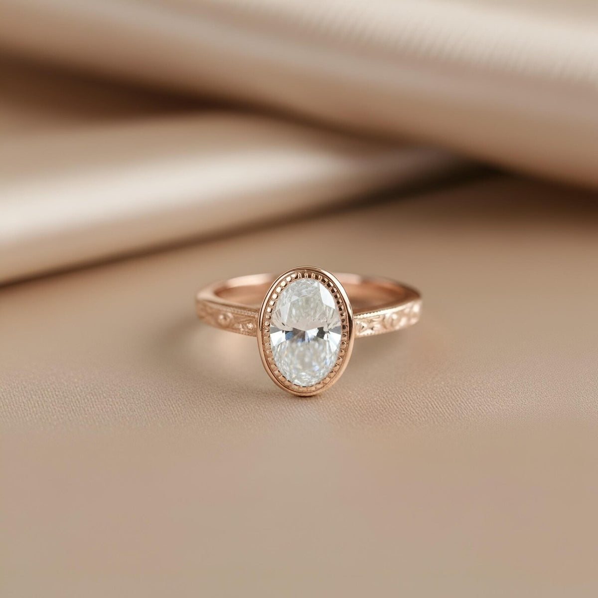 Rose gold 2 carat oval lab grown diamond bezel solitaire engagement ring on soft neutral background.