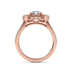 Side profile view of a 2 carat round lab diamond vintage halo ring in 14K rose gold with intricate bridge curves.