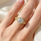 filigree-yellow-gold-round-diamond-ring-worn-on-hand