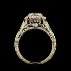 An ornate yellow gold filigree ring with a large round-cut center stone and smaller accent stones, shown against a solid black background.