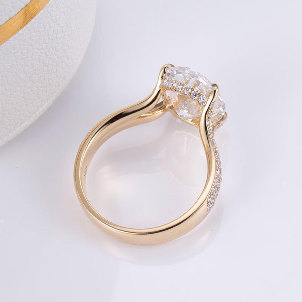 hidden-halo-oval-diamond-engagement-ring-side-profile