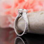 antique-style-lab-grown-diamond-ring-with-hand-engraved-band-angled-view