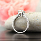 side-profile-of-2ct-round-lab-diamond-vintage-engagement-ring-on-stone