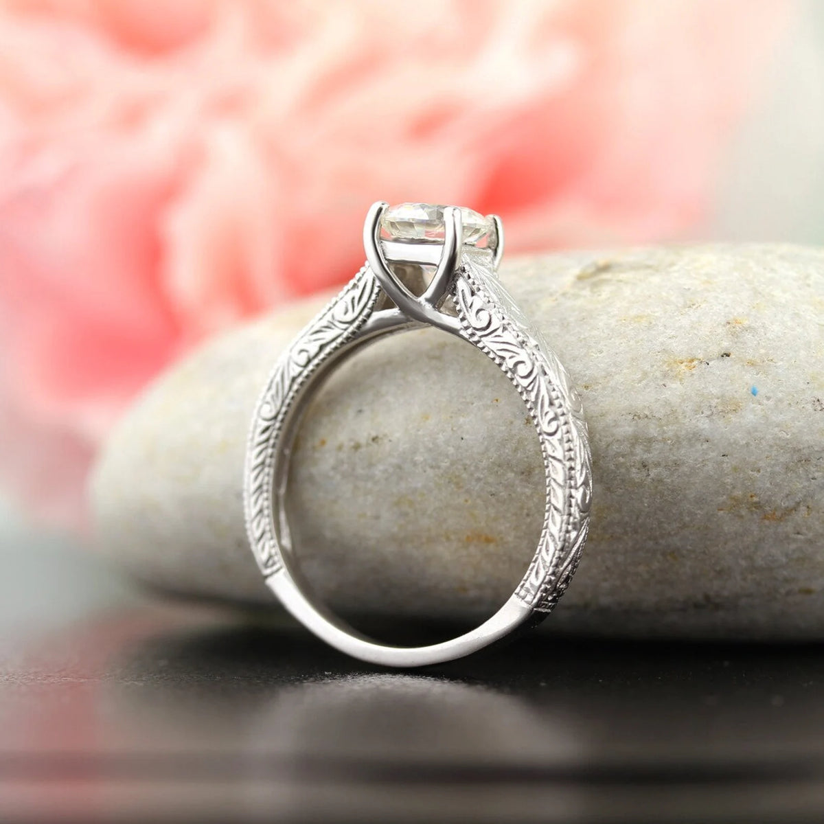side-profile-of-2ct-round-lab-diamond-vintage-engagement-ring-on-stone
