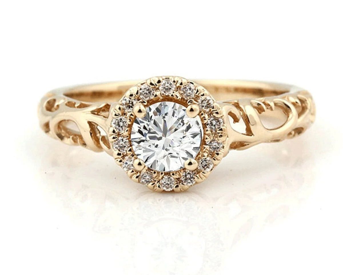 top-down-view-of-round-cut-lab-grown-diamond-halo-ring-with-filigree-band