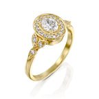 angled-perspective-of-oval-lab-grown-diamond-halo-ring-showing-milgrain-and-band-details