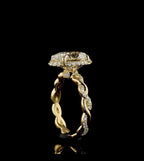Angled view showcasing the brilliant 4ct oval cut lab grown diamond and micro-pavé hidden halo collar in yellow gold.