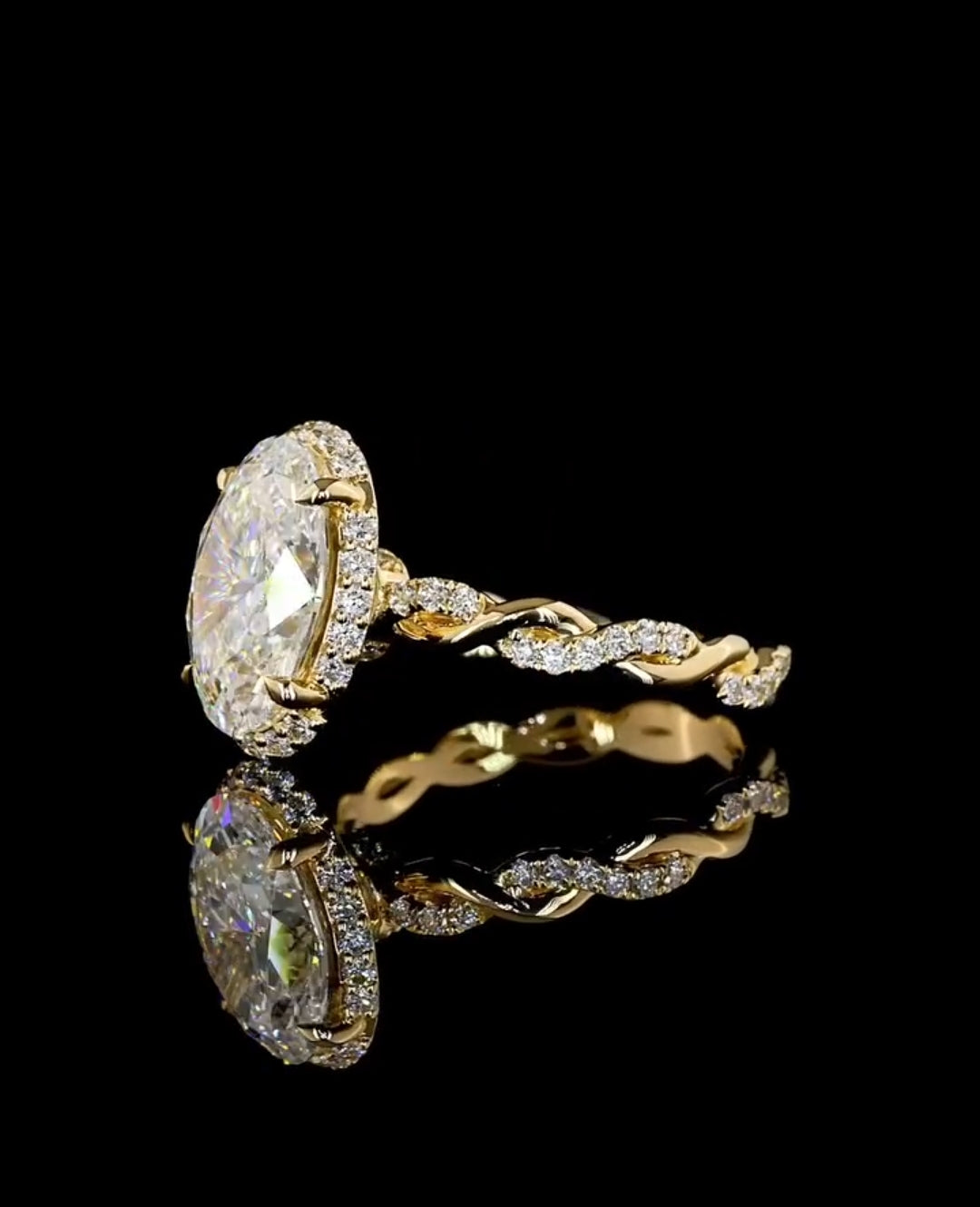 Side perspective shot highlighting the intricate twisted diamond braid band and setting of a 4ct oval lab diamond ring.