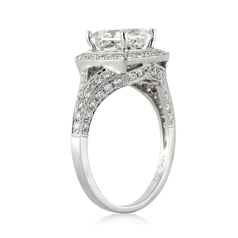 angled-profile-view-of-princess-cut-lab-diamond-halo-engagement-ring-in-white-gold