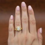 2ct-oval-lab-grown-diamond-bezel-ring-worn-on-hand-lifestyle-view