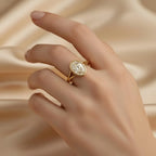 3-carat-oval-cut-lab-grown-diamond-bezel-set-engagement-ring-worn-on-hand