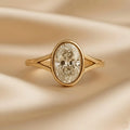 front-macro-view-of-3-carat-oval-lab-grown-diamond-bezel-set-ring