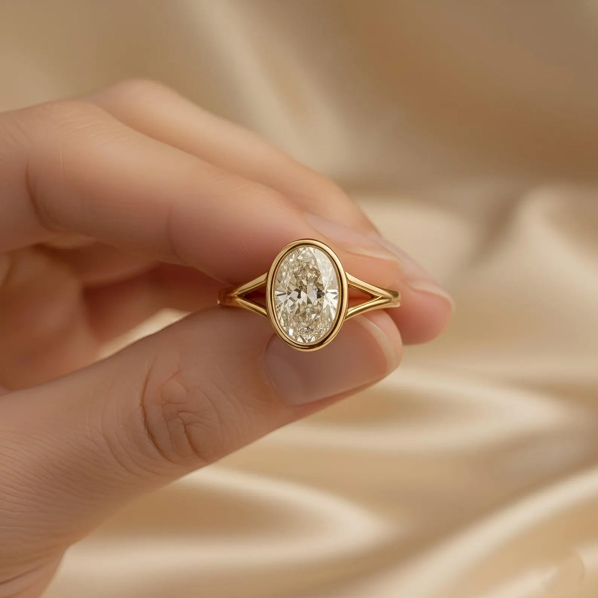 close-up-hand-held-view-of-oval-cut-lab-grown-diamond-engagement-ring